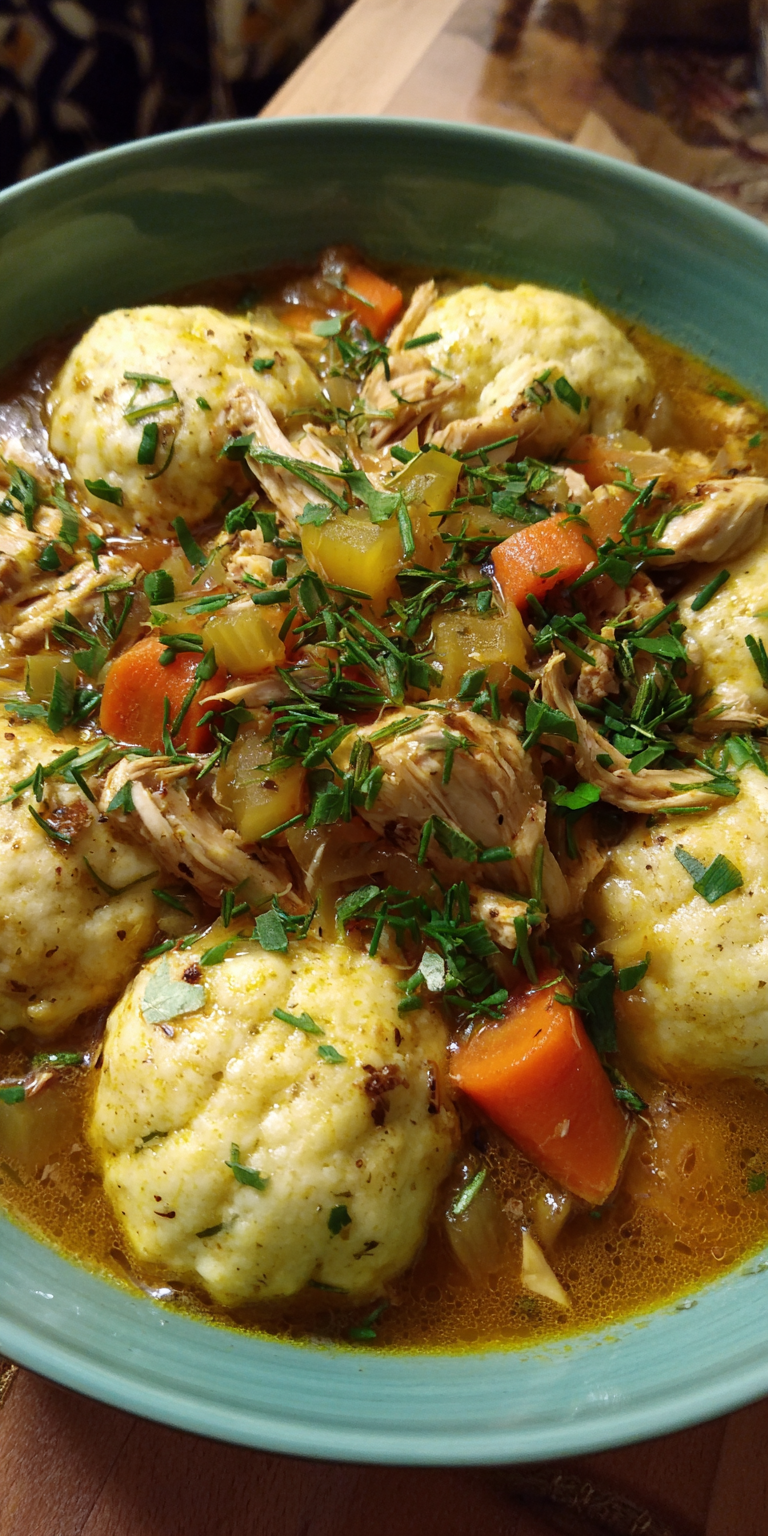 Cornmeal Dumplings Chicken Stew served warm with cozy spices