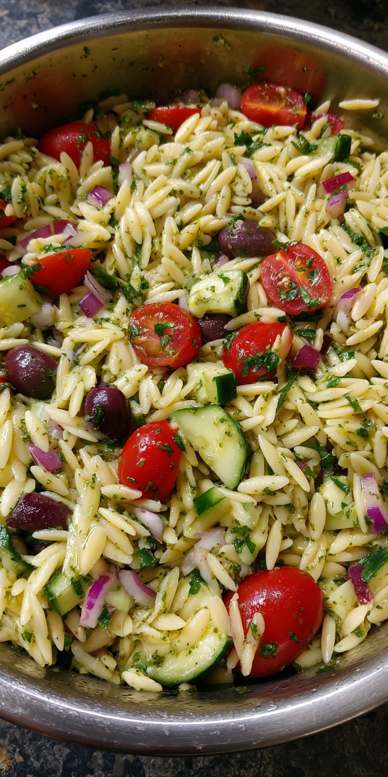 Creamy Pesto Orzo Mediterranean Salad served warm with cozy spices
