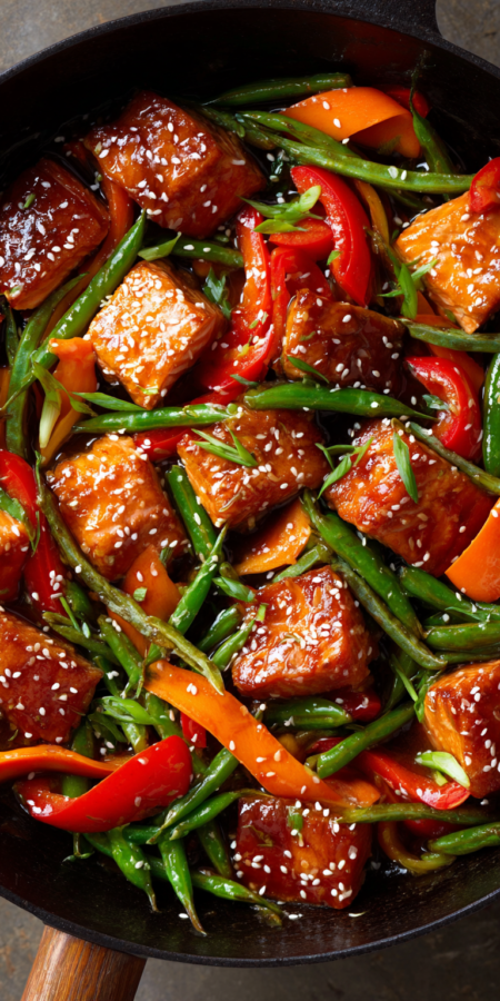 Sticky Sesame Salmon Stir Fry served warm with cozy spices