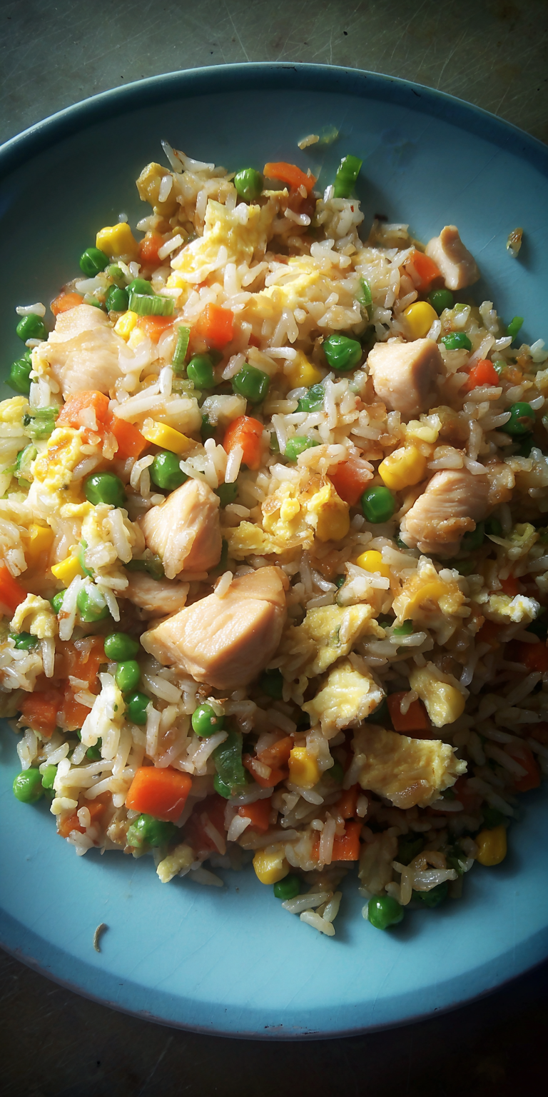 Fried Rice with Chicken Simple and Quick served warm with cozy spices